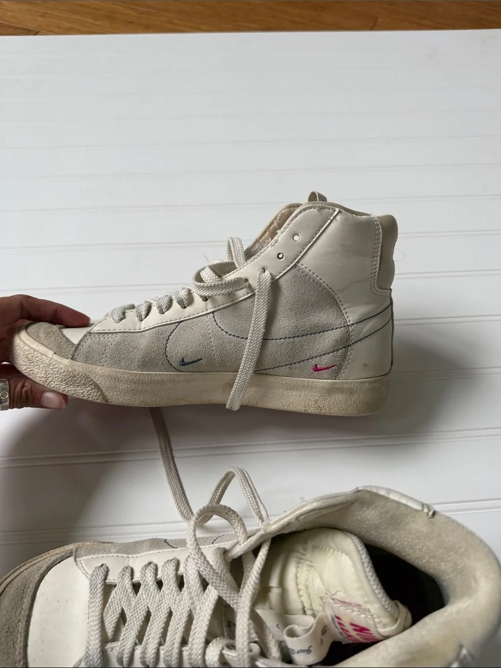 Nike Blazer Mid Top Sneakers in White and Blue Swoosh
